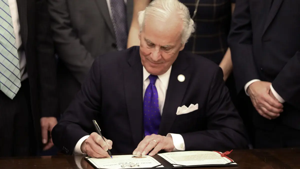 South Carolina Gov. Henry McMaster signing a ceremonial bill in Columbia