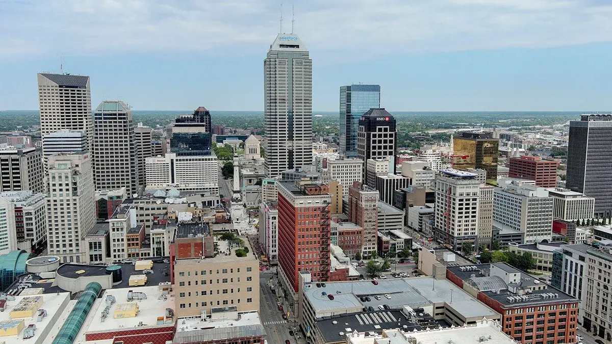 Downtown Indianapolis skyline with buildings under a clear sky