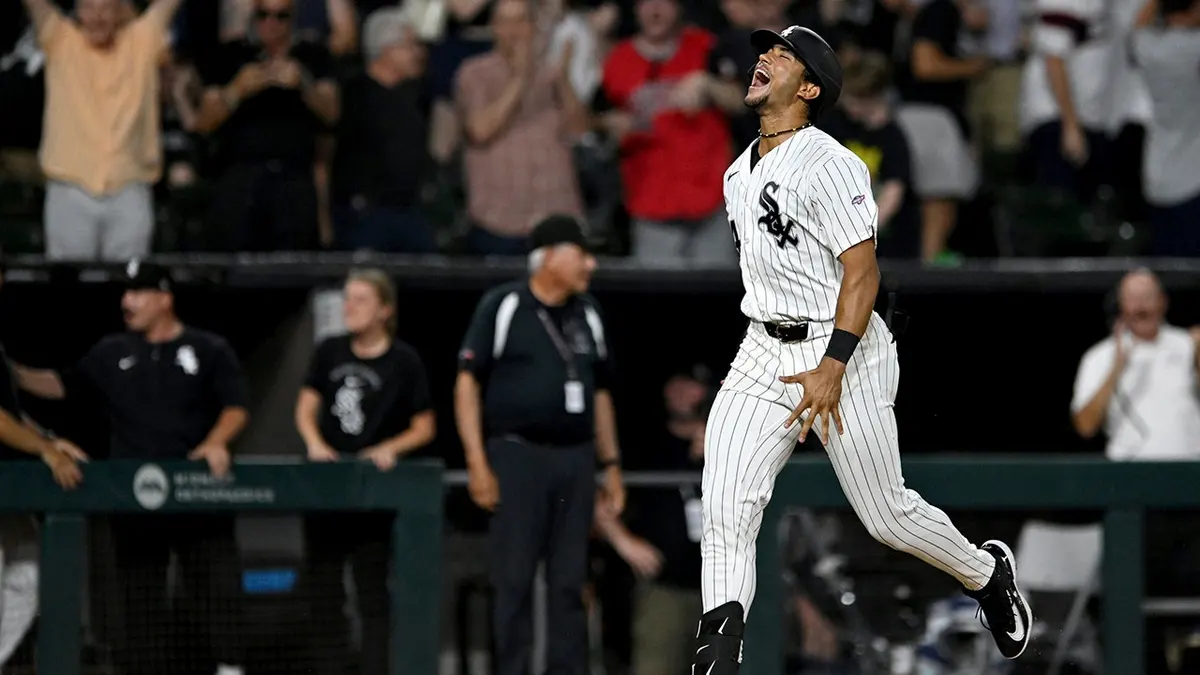 Braden Montgomery celebrating after hitting a walk-off home run in a baseball game.