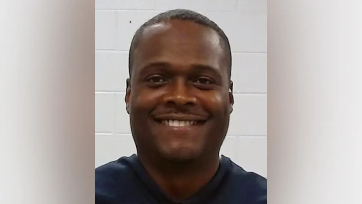 Sholdon Daniels standing in front of a neutral background