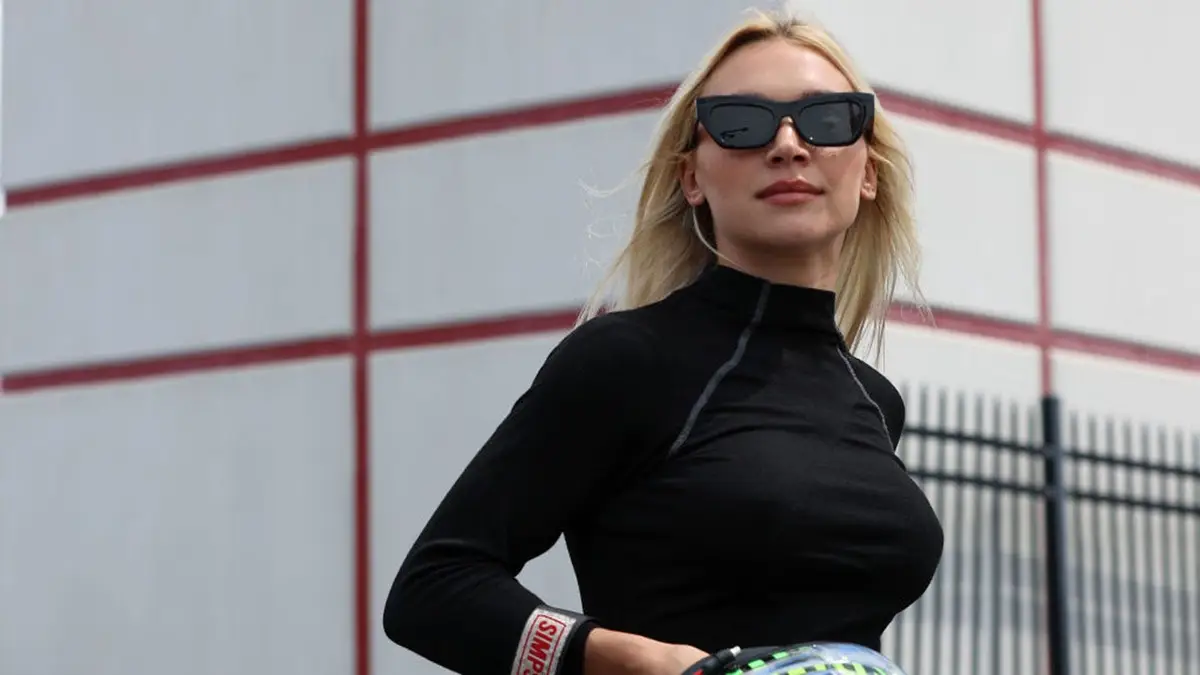 Natalie Decker walking the grid at Charlotte Motor Speedway during NASCAR Xfinity Series practice