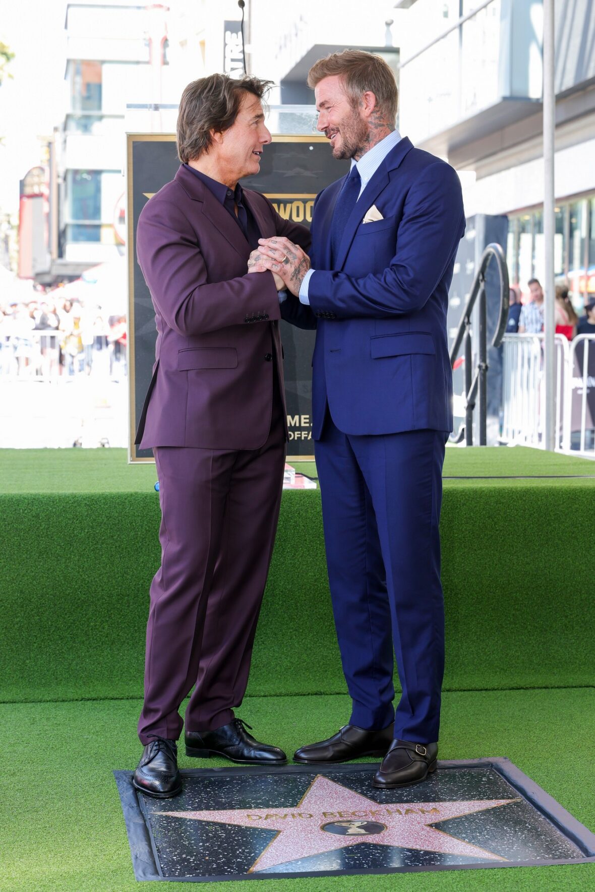 David Beckham posa com Tom Cruise em sua cerimônia de estrela na Calçada da Fama