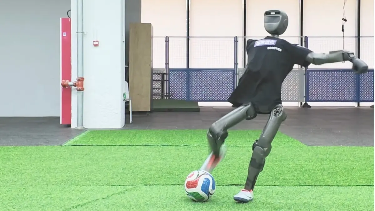 A robot kicking a soccer ball