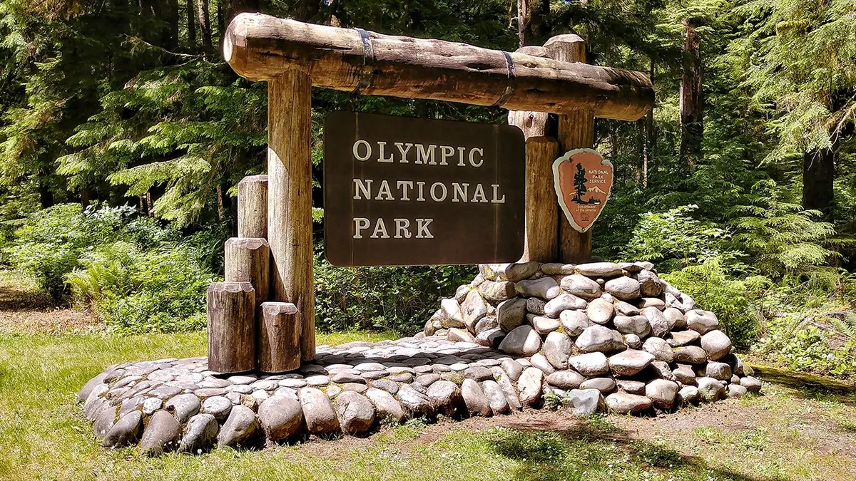 Olympic National Park Washington welcome sign at park entrance