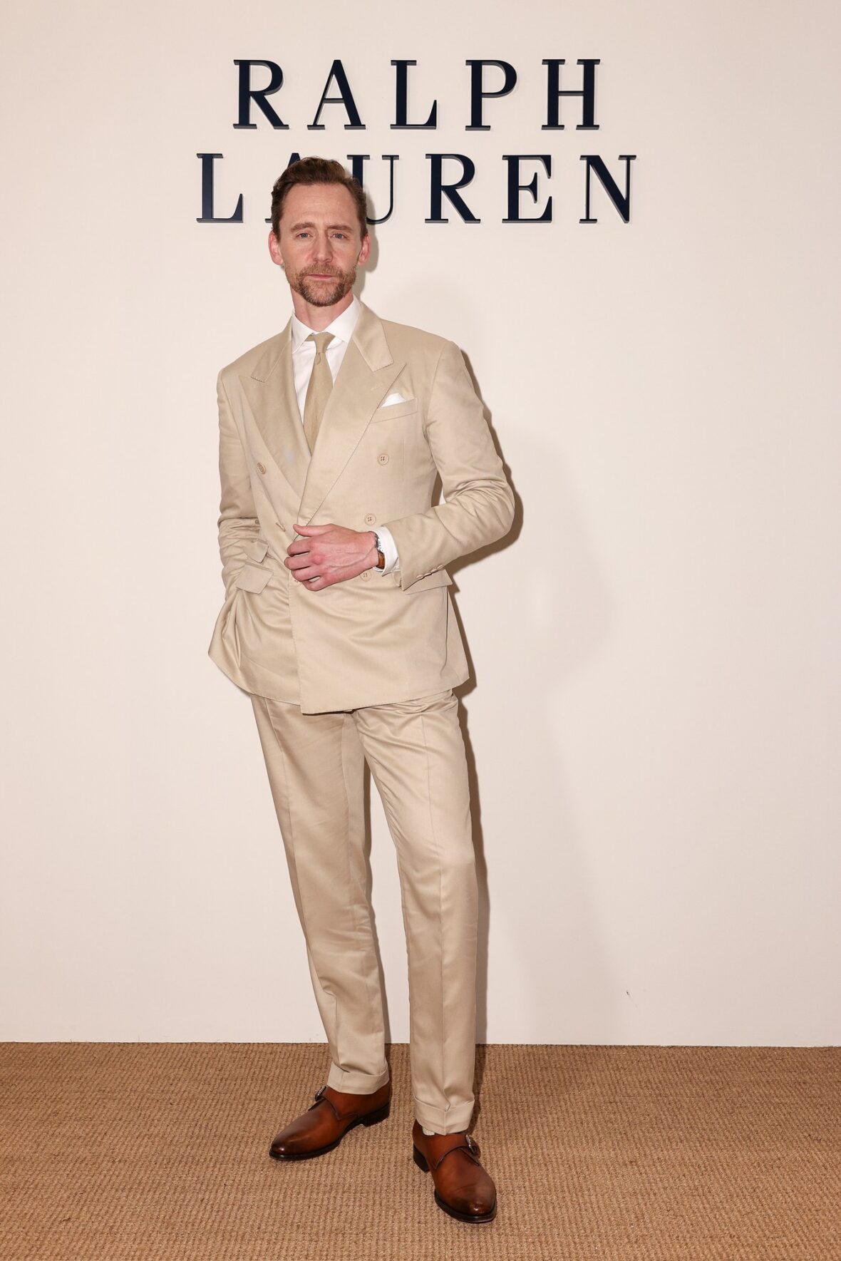 Celebridades participando do desfile da Ralph Lauren em Milão