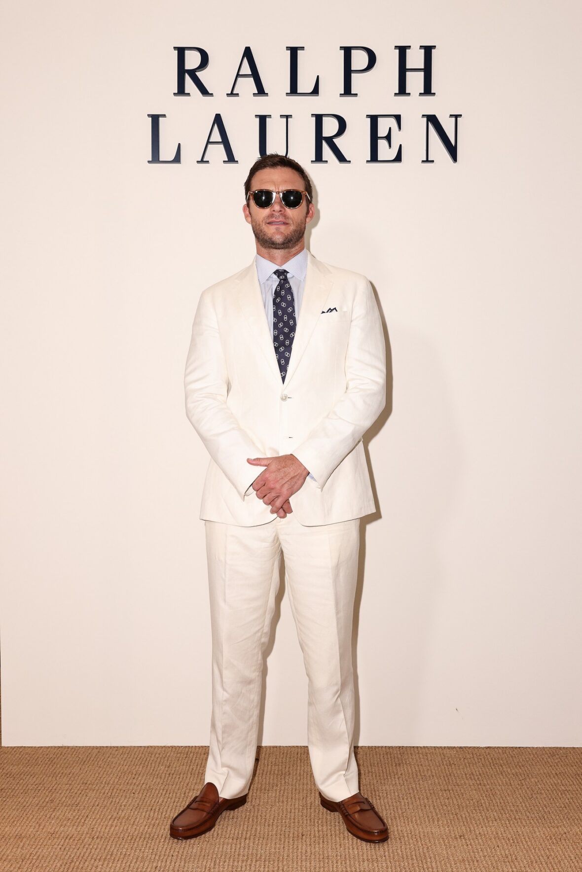 Celebridades participando do desfile da Ralph Lauren em Milão