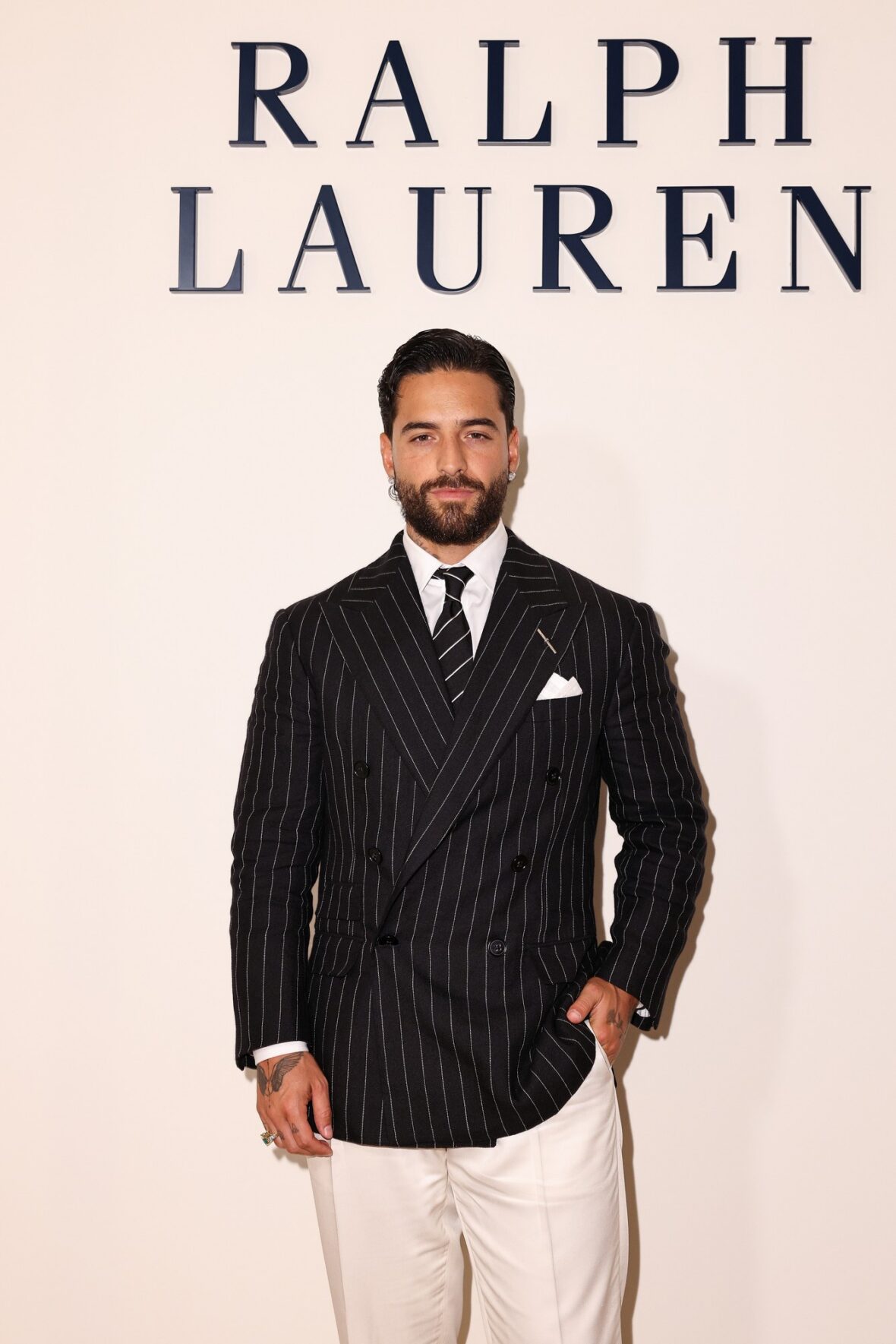 Celebridades participando do desfile da Ralph Lauren em Milão