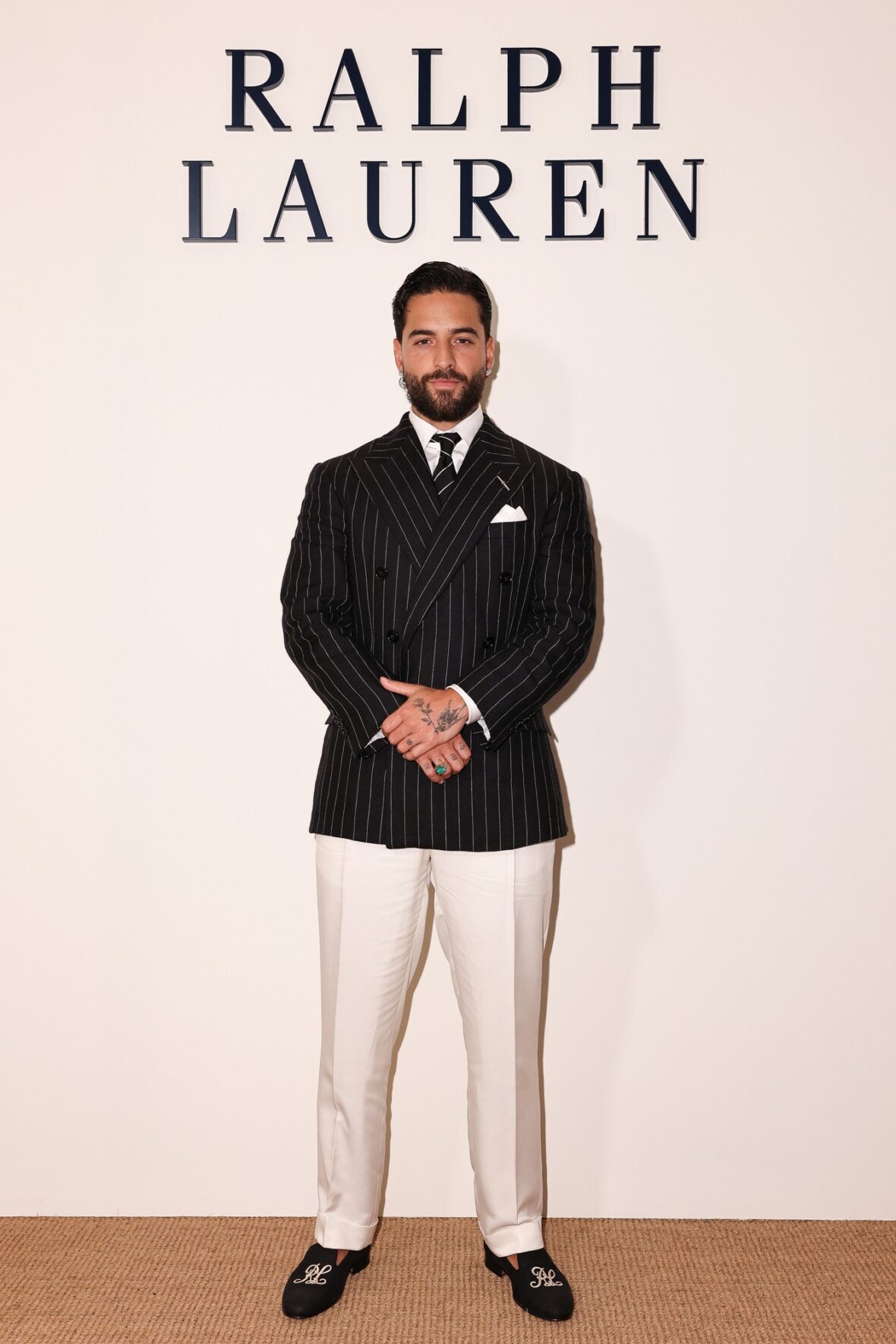 Celebridades participando do desfile da Ralph Lauren em Milão