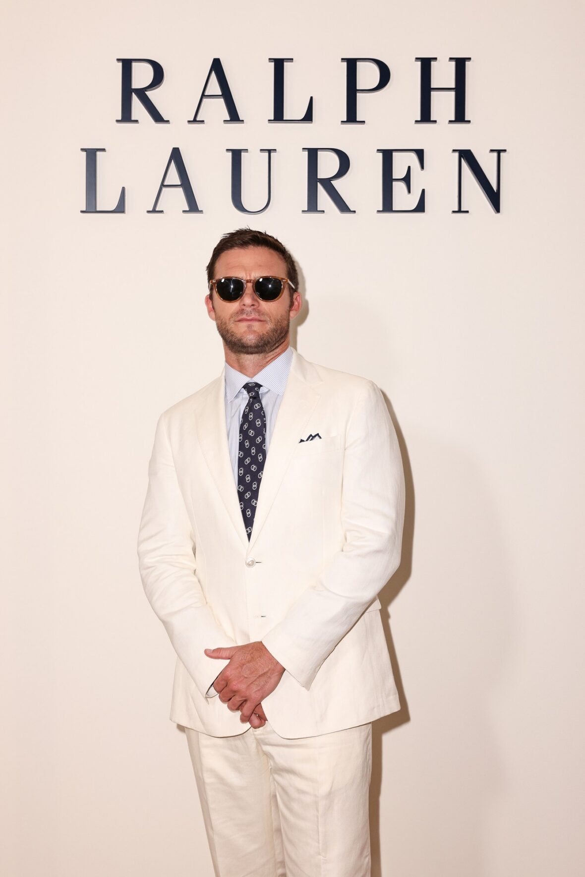 Celebridades participando do desfile da Ralph Lauren em Milão