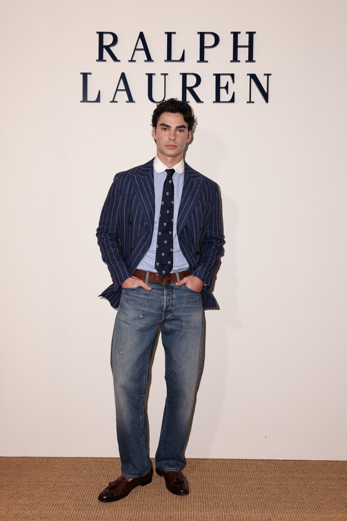 Celebridades participando do desfile da Ralph Lauren em Milão