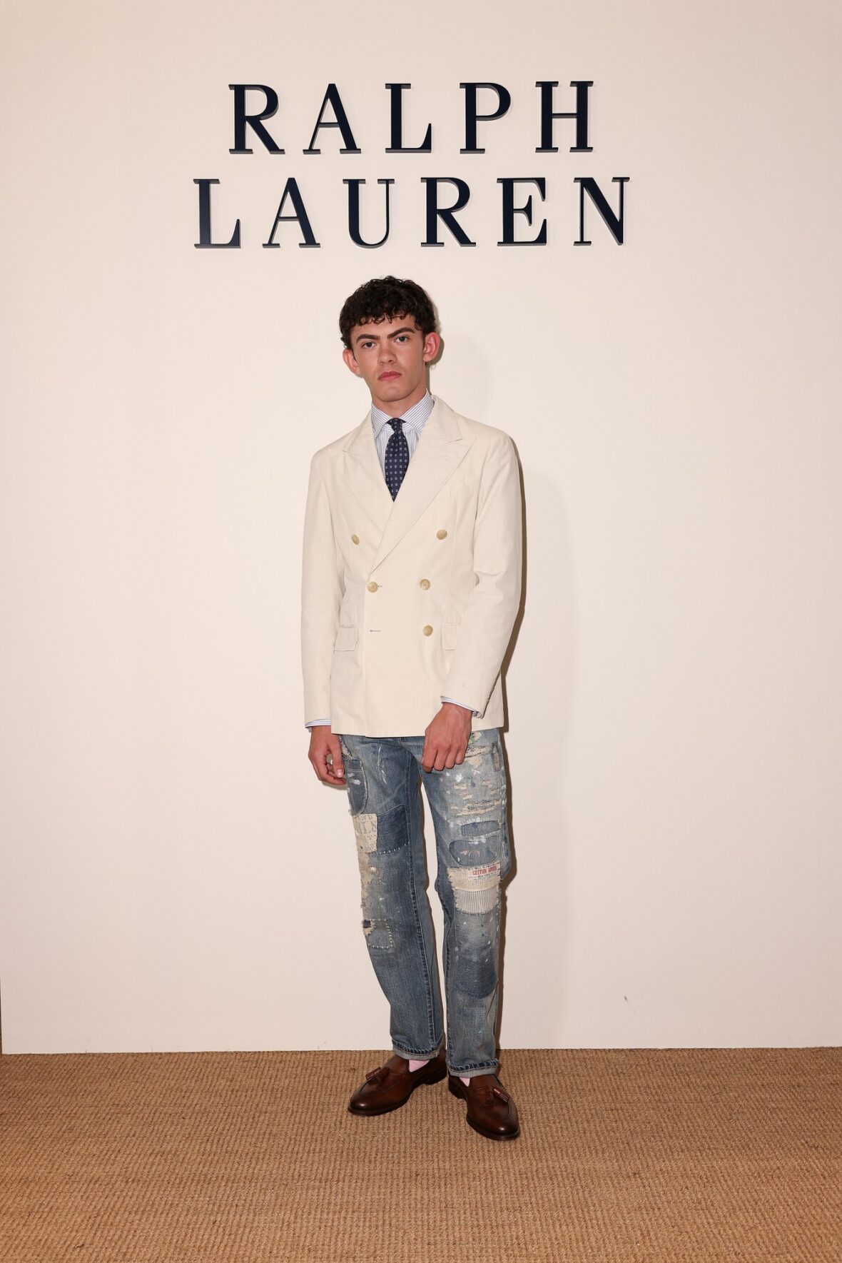 Celebridades participando do desfile da Ralph Lauren em Milão
