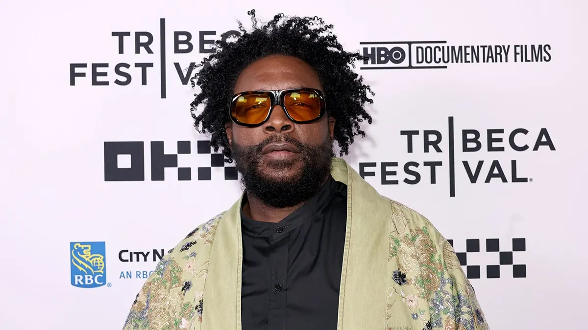 Ahmir Questlove Thompson standing at the Earth Wind and Fire opening night premiere at Beacon Theatre