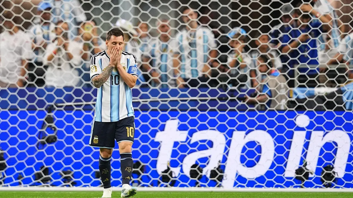 Argentina's Lionel Messi reacts after missing a penalty shot during a soccer match in Arlington, Texas.