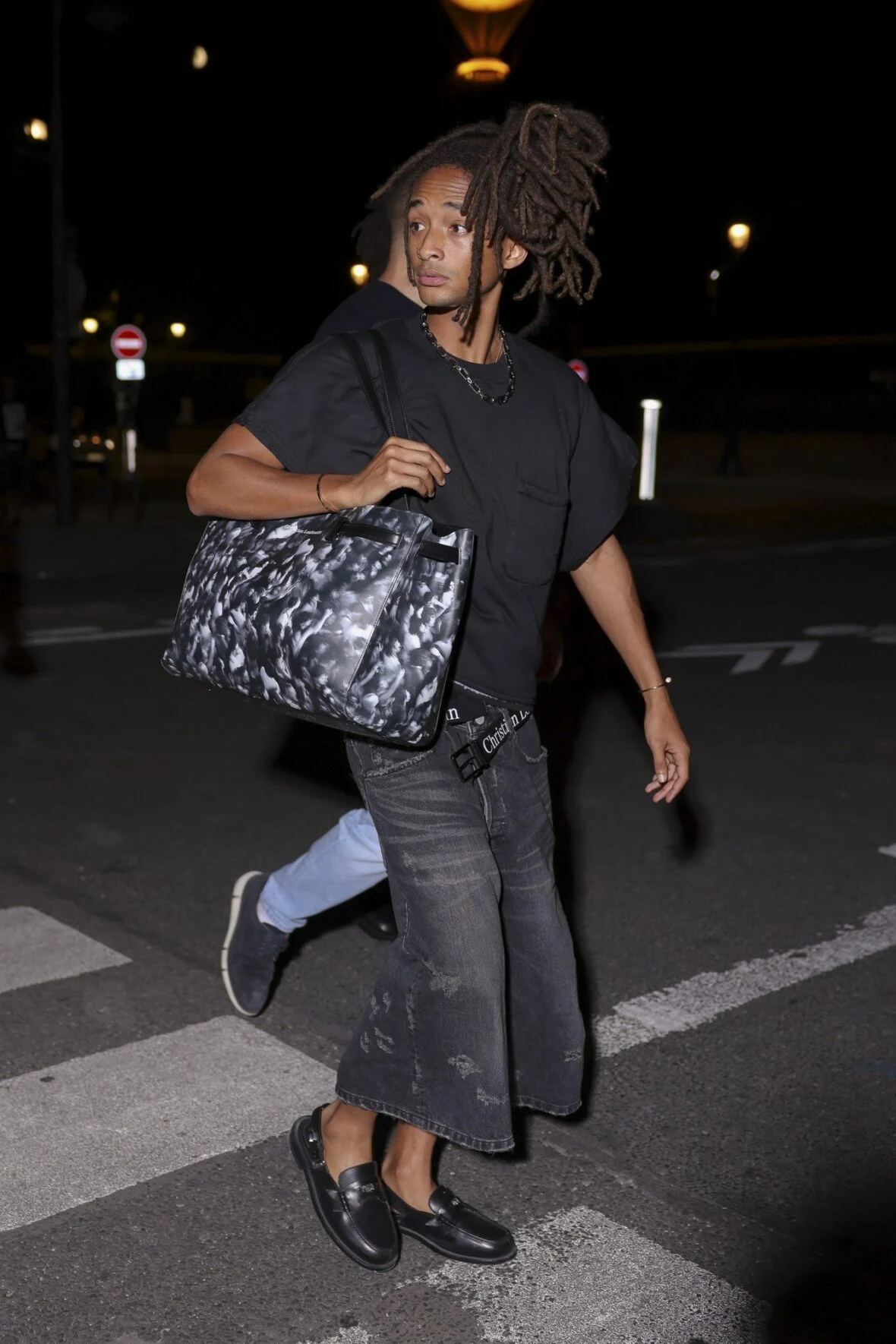 Will Smith em Paris com a esposa Jada Pinkett Smith e o filho Jaden Smith durante a semana de moda