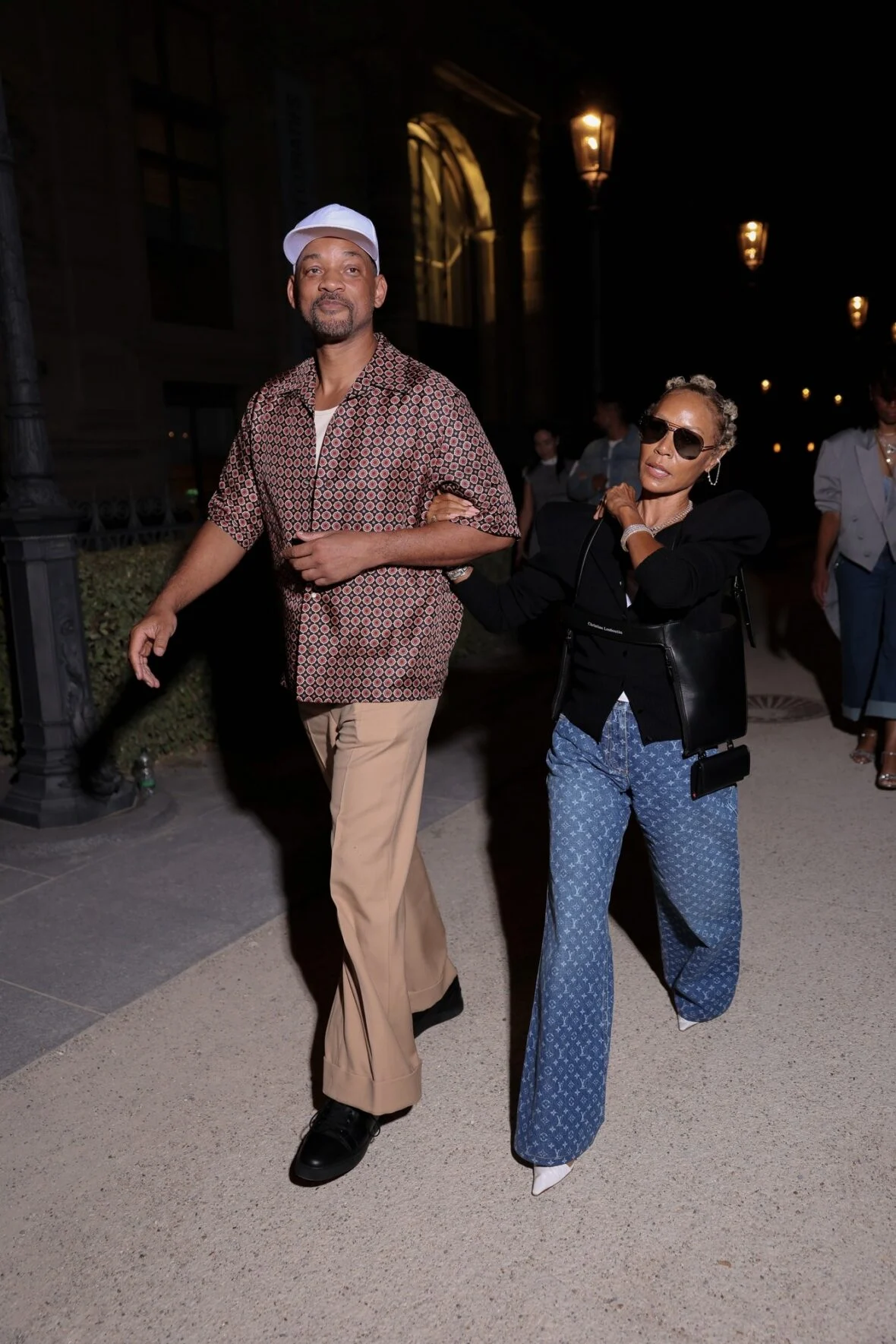 Will Smith em Paris com a esposa Jada Pinkett Smith e o filho Jaden Smith durante a semana de moda