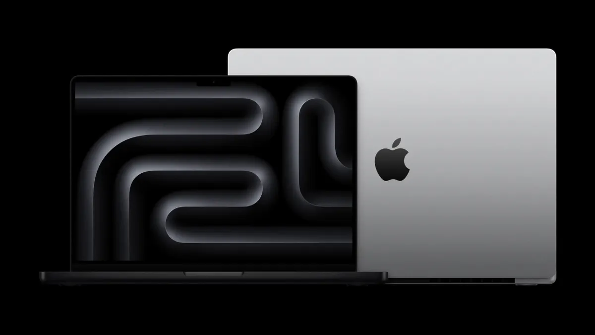 M4 MacBook Pro laptop displayed with Apple logo visible.