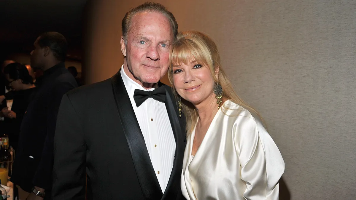 Frank Gifford and Kathie Lee Gifford standing together at the Literacy Partners Evening of Readings Gala in New York City