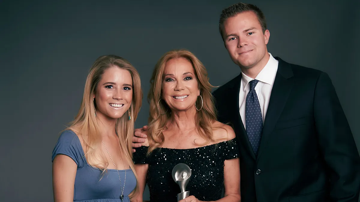 Kathie Lee Gifford standing with Cody Gifford and Cassidy Gifford at an event.