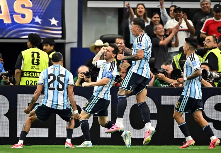 Soccer Football - FIFA World Cup 2026 - Group J - Argentina v Austria - Dallas Stadium, Arlington, Texas, U.S. - June 22, 2026
Argentina's Lionel Messi celebrates scoring their first goal with Enzo Fernandez, Facundo Medina and Thiago Almada IMAGN IMAGES via Reuters/Maria Lysaker     TPX IMAGES OF THE DAY