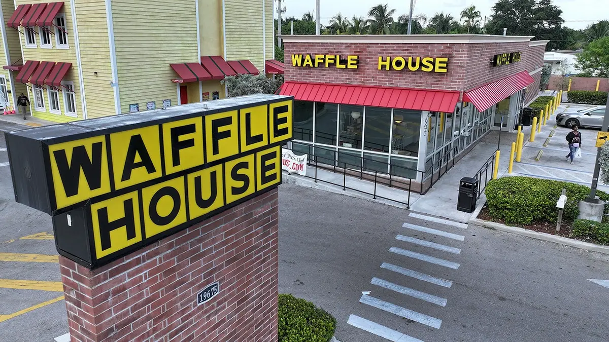 The exterior of a Waffle House restaurant.