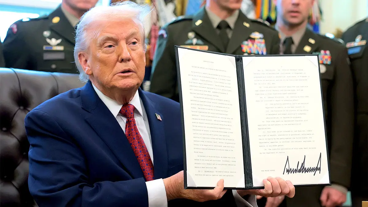 President Donald Trump holds a signed executive order in the Oval Office. The administration's 2025 nuclear energy executive orders directed the Department of Energy to accelerate advanced reactor testing and deployment. File photo.