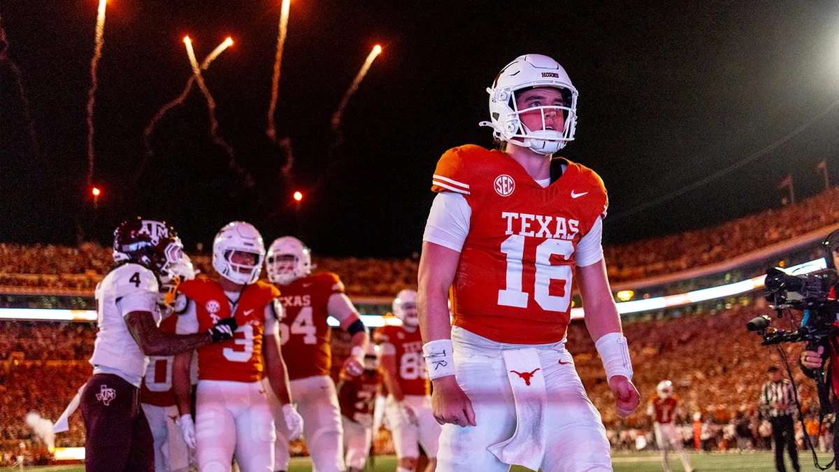 Texas quarterback Arch Manning celebrating a touchdown during a football game in Austin