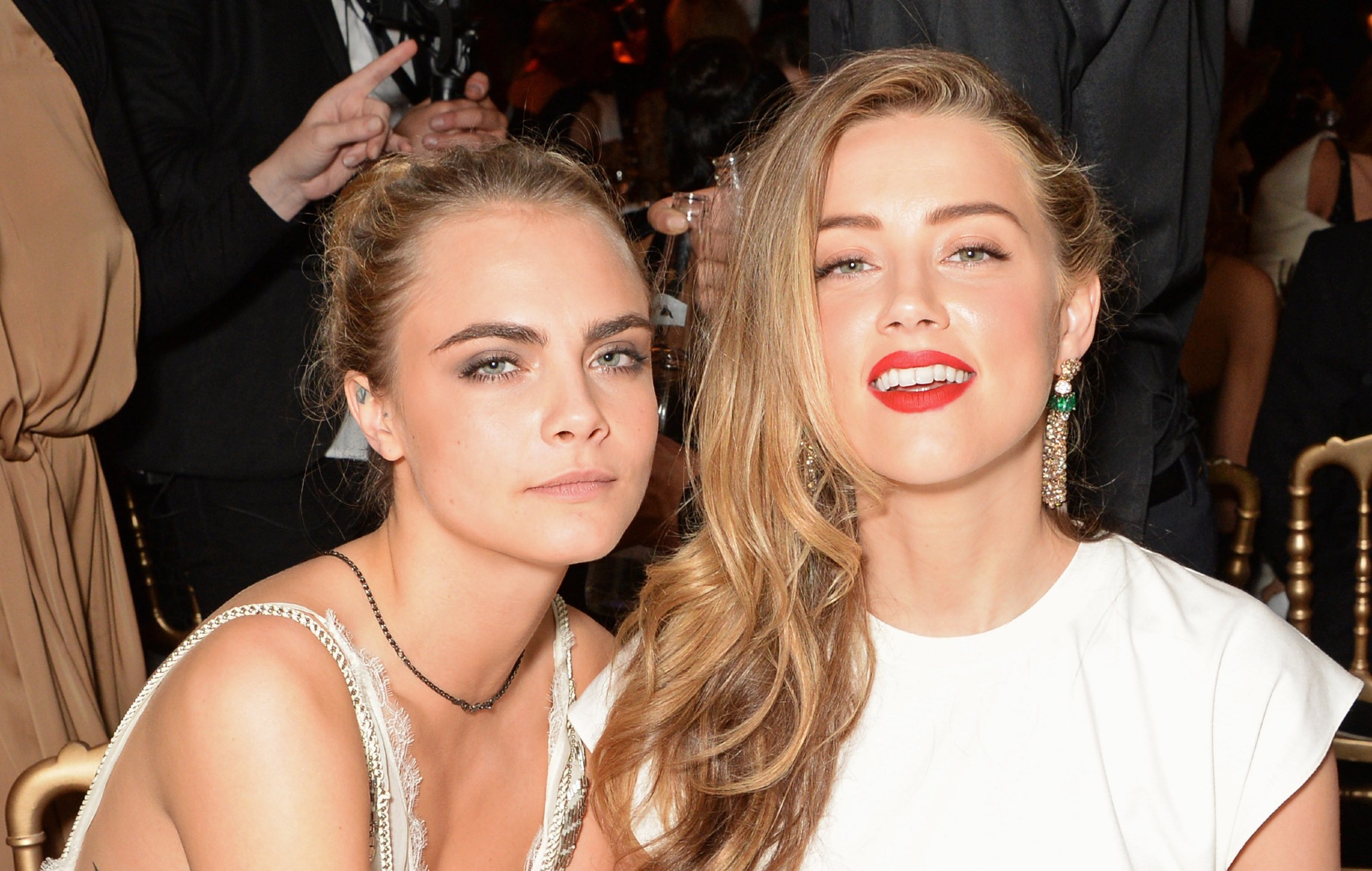 Cara Delevigne and Amber Heard pictured together in 2014. CREDIT: David M. Benett/Getty Images