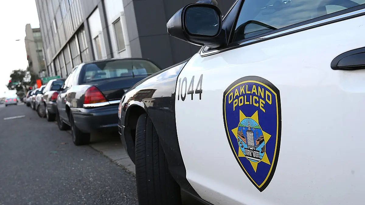 An Oakland Police patrol car parked outside Oakland Police headquarters.