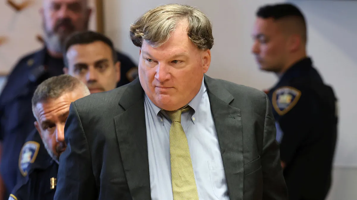 Gilgo Serial Killer Rex Heuermann stands in court for sentencing.