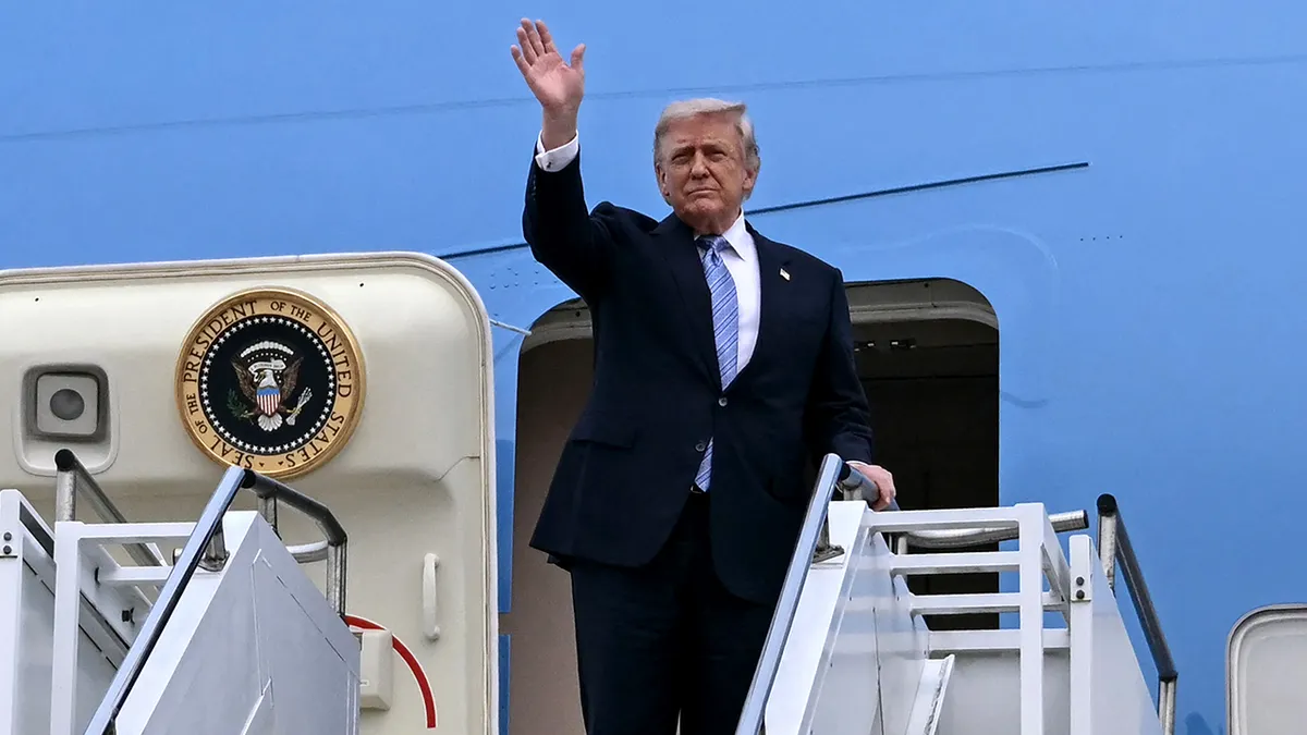 President Donald Trump waves on Air Force 1.
