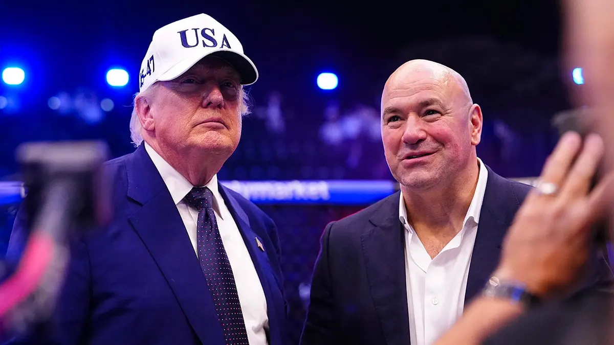 President Donald J. Trump and UFC President Dana White standing on the South Lawn at the White House.