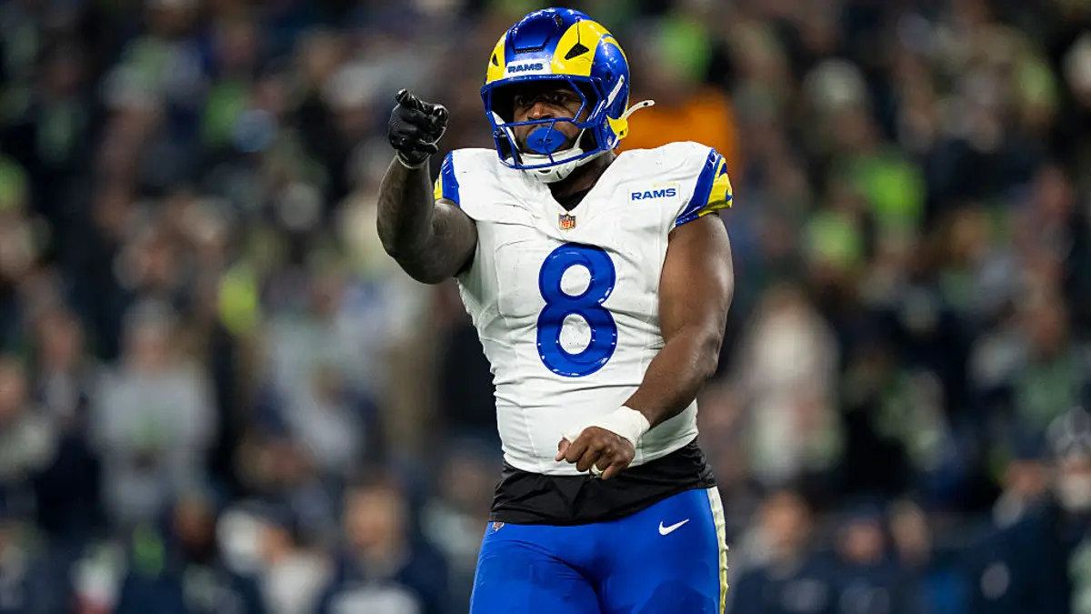 Jared Verse of the Los Angeles Rams reacting on the field at Lumen Field