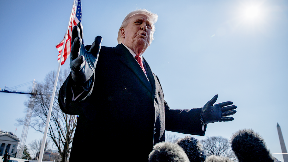 President Donald Trump speaking to media on the South Lawn of the White House
