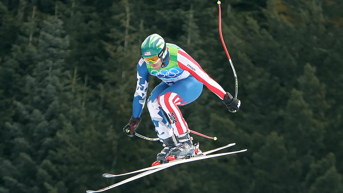 Bode Miller skiing downhill during the Vancouver 2010 Winter Olympics at Whistler Creekside.