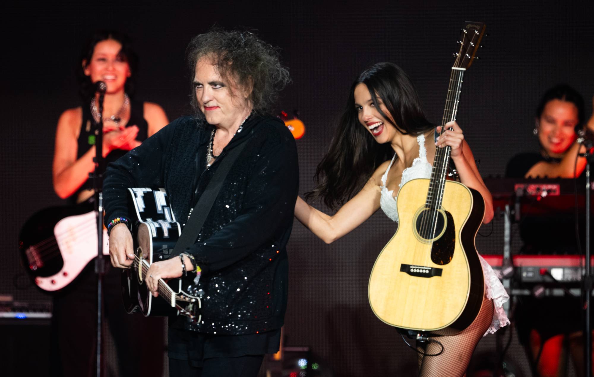 Robert Smith of The Cure and Olivia Rodrigo at Glastonbury 2025. CREDIT: Samir Hussein/WireImage