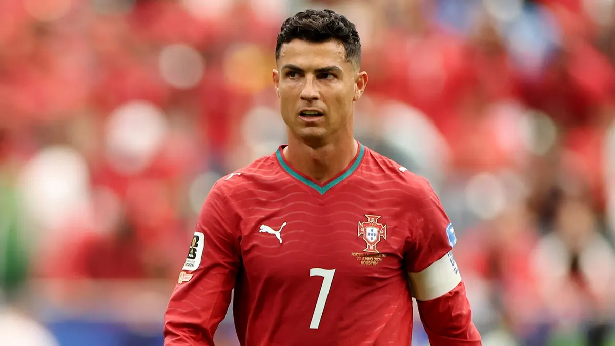 Cristiano Ronaldo reacting on the field during a soccer match at Houston Stadium.