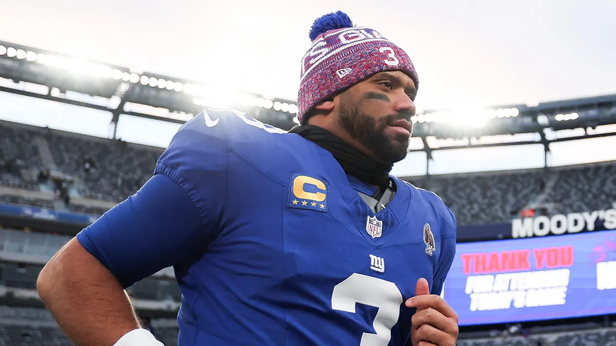 Russell Wilson runs off field