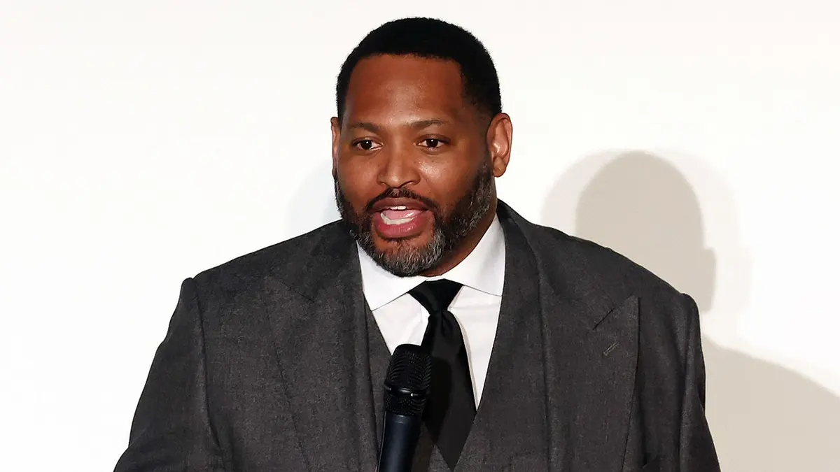 Robert Horry standing on stage at the Easterseals Disability Film Challenge event