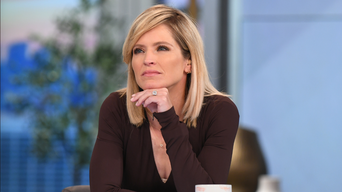 Sara Haines seated on The View panel