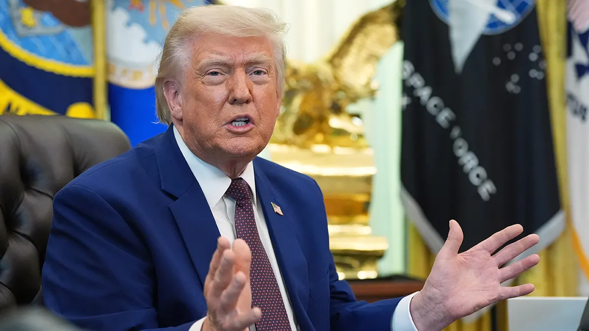 President Donald Trump speaking in the Oval Office of the White House
