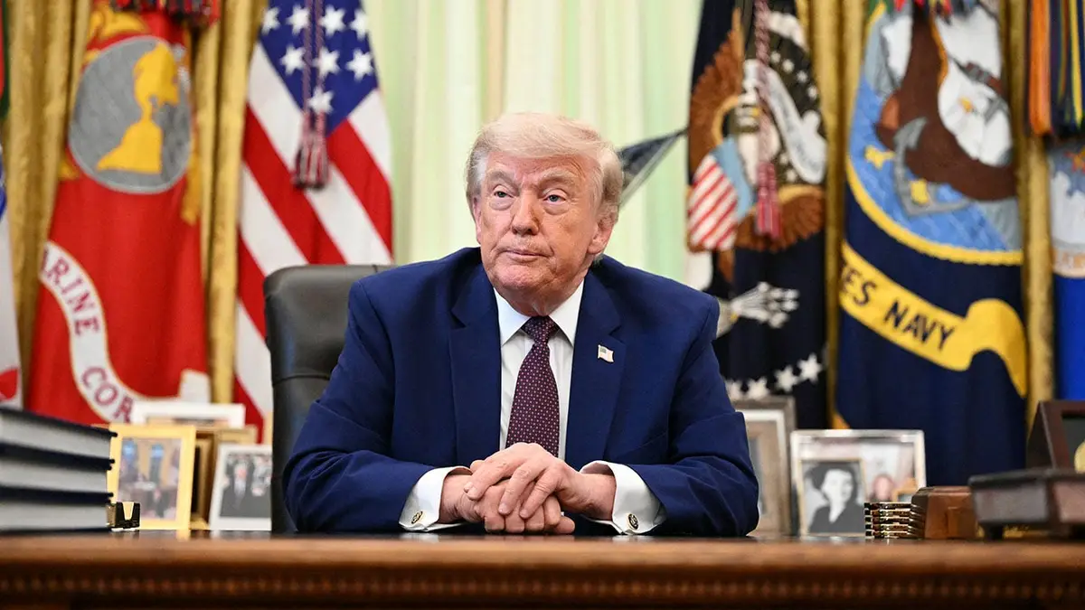 President Donald Trump speaking to the press in the Oval Office