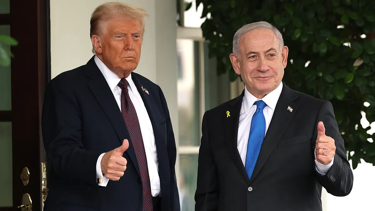 President Donald Trump and Israeli Prime Minister Benjamin Netanyahu greeting each other at the White House
