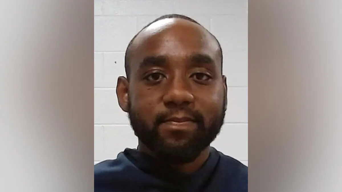Jerome Winston Parker standing in front of a wall