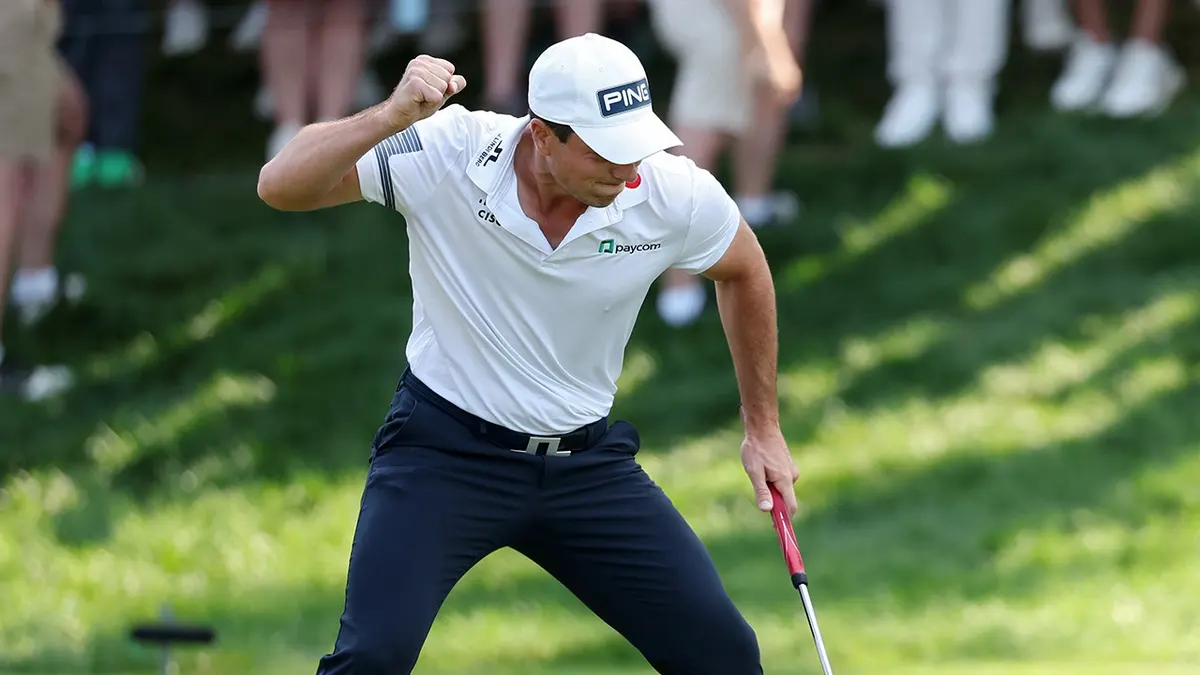 Viktor Hovland reacting after making birdie on the 18th green in a playoff at TPC River Highlands
