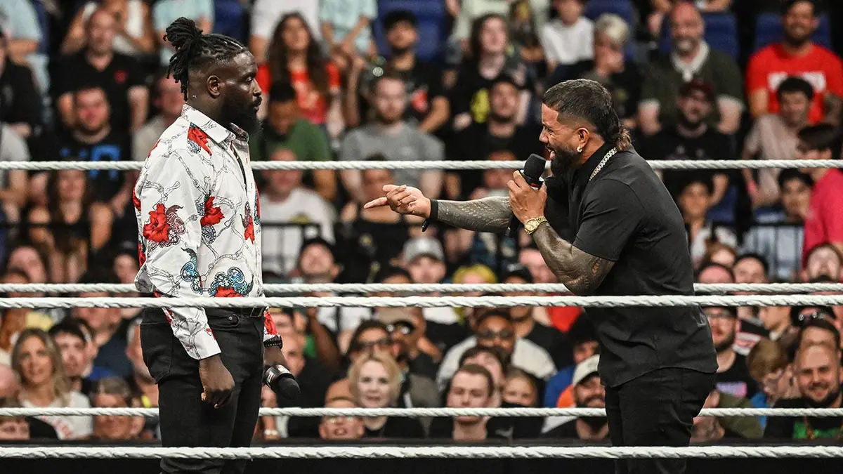 Oba Femi and Jey Uso speaking in the ring during Monday Night RAW at The O2 Arena in London