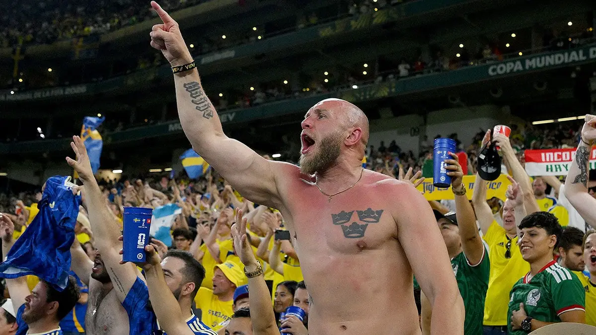Fans of Sweden celebrating at Monterrey Stadium in Guadalupe, Mexico.