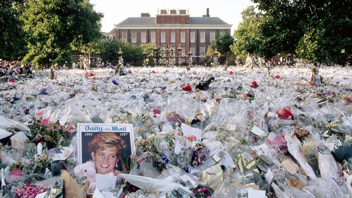 A multi-colored sea of floral tributes outside the gates of Princess Diana