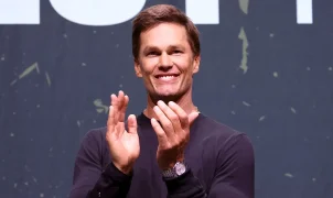 Tom Brady attempts to slap Logan Paul at Fanatics Fest in New York