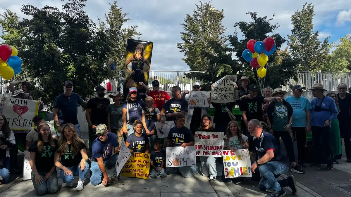 Fans celebrate Sophie Cunningham at a rally in Seattle.