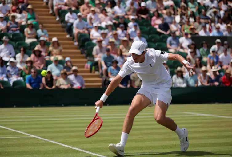 Tennis - Wimbledon - All England Lawn Tennis and Croquet Club, London, Britain - July 3, 2026 Brazil's Joao Fonseca in action during his third round match against Russia's Roman Safiullin REUTERS/Marko Djurica